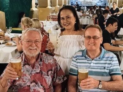 John enjoying some durian and friendship in Singapore