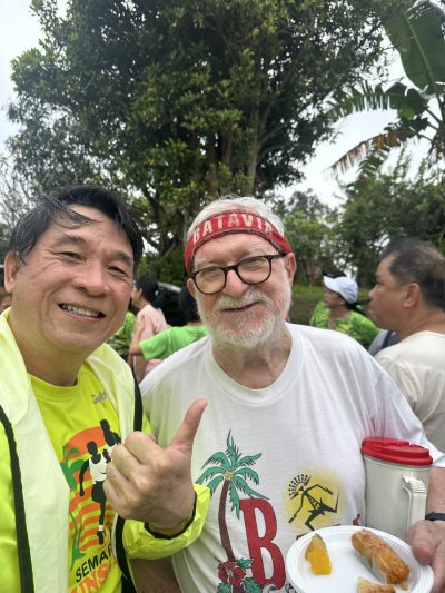 It was taken during a particular special hash run in "Lerep" area,  on the 12 of May 2025. Me, Herry and dearest friend John.