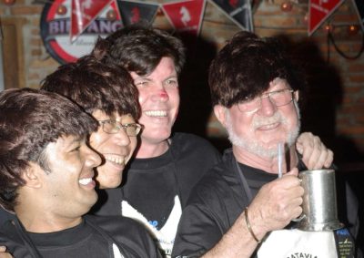 John was given a wig to wear (along with others) to join the new hash committee.
